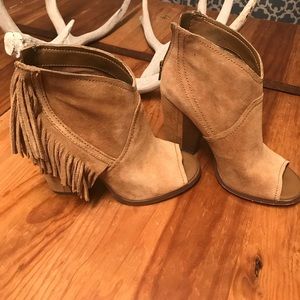 Gianni Bini Ankle booties with fringe.